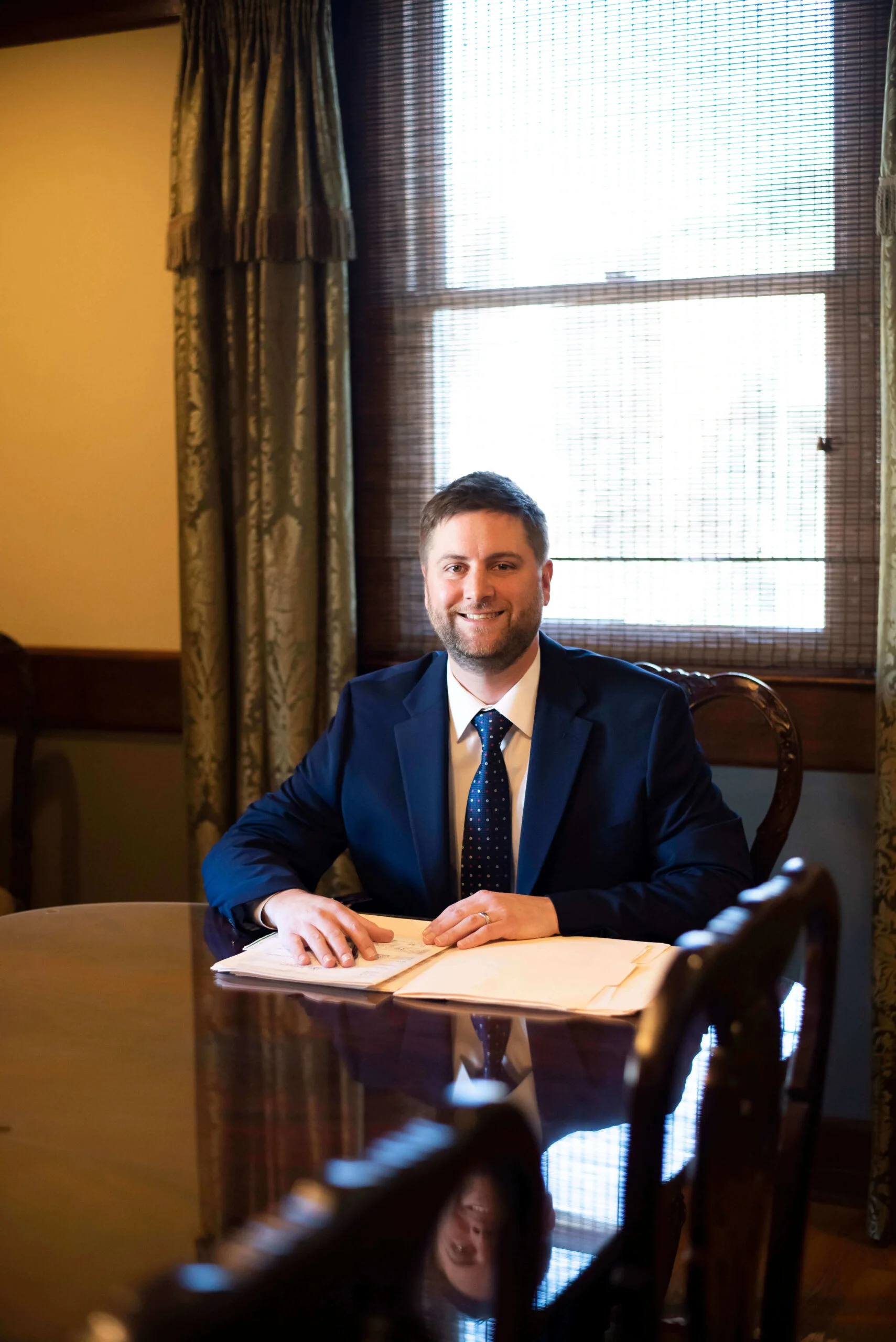 Alimony attorney smiling after a successful case in Durham, North Carolina at Constantinou & Burkert Accident Injury Lawyers Law Office